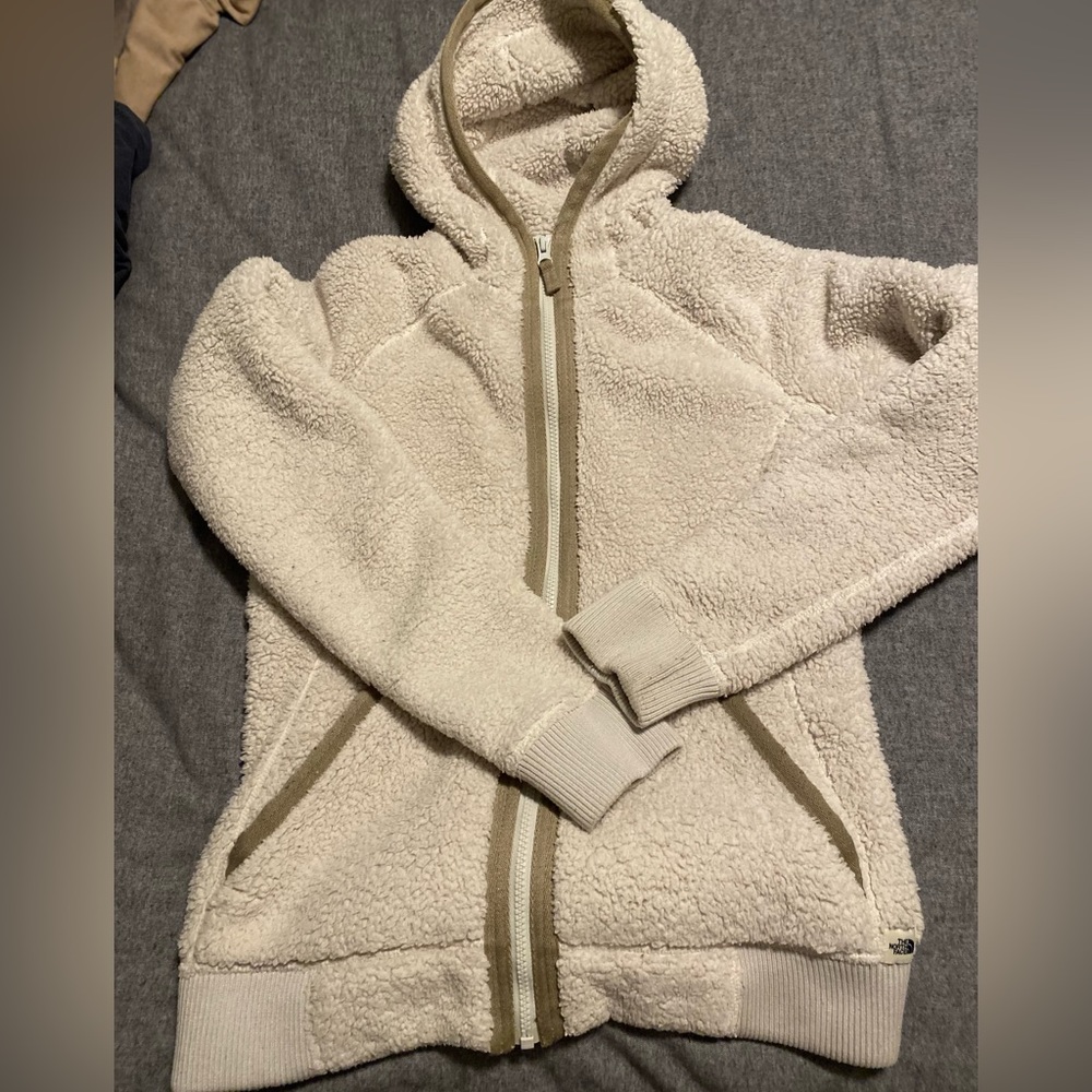 The North Face Fleece, size‎ M, fuzzy/furry, beige color with tan trim.